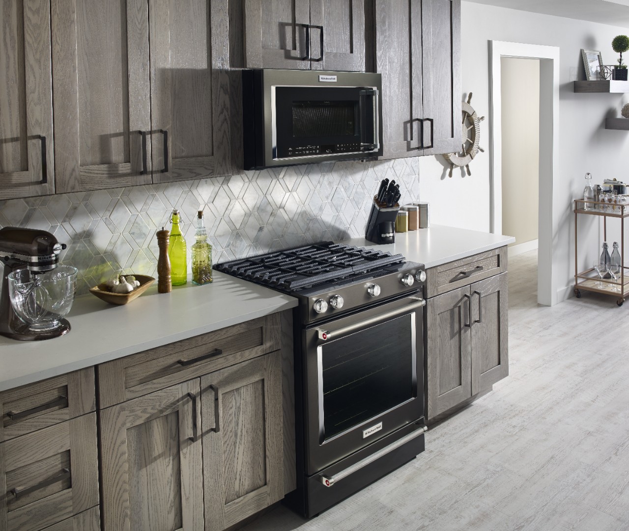 Save space with a KitchenAid® Microwave Hood Combination Oven Save space with a KitchenAid® Microwave Hood Combination Oven