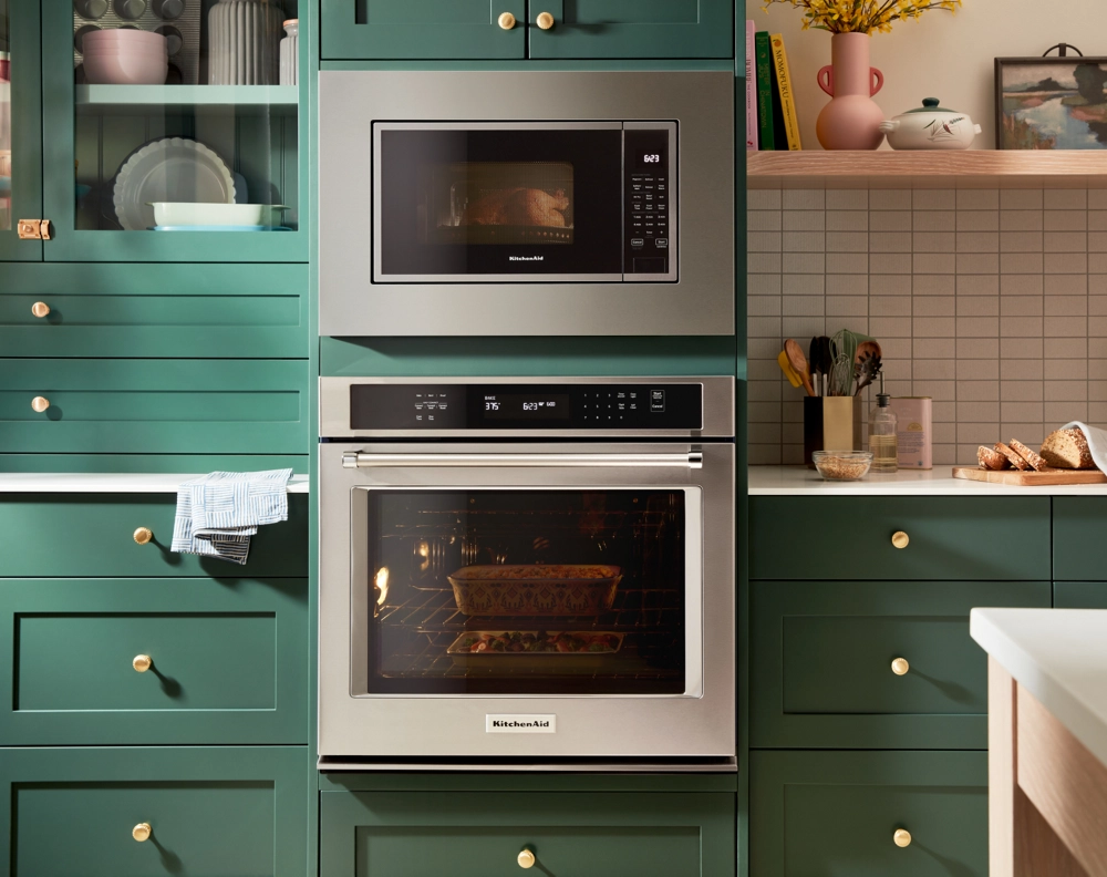 A KitchenAid® wall oven and microwave in a kitchen.